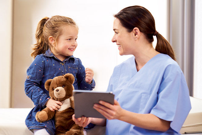 pediatrics nurse with patient